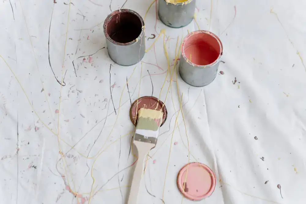 Close up of premium miniature paints lined up on a shelf